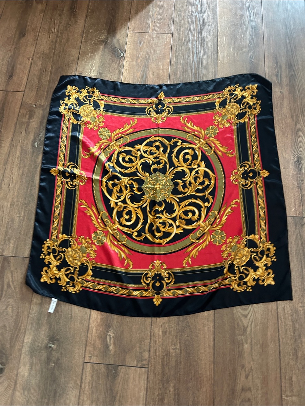 Black, red and gold scarf from Ames de Paris